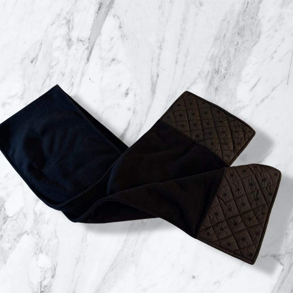Eddie Bauer finely woven fleece‎ scarf in black with a quilted accent. 64" x 9"